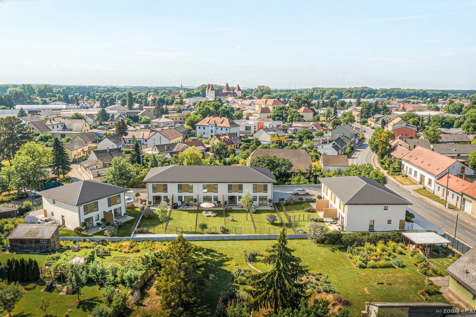 Luftbild der Wohnanlage Orth an der Donau mit Blick über den Ort